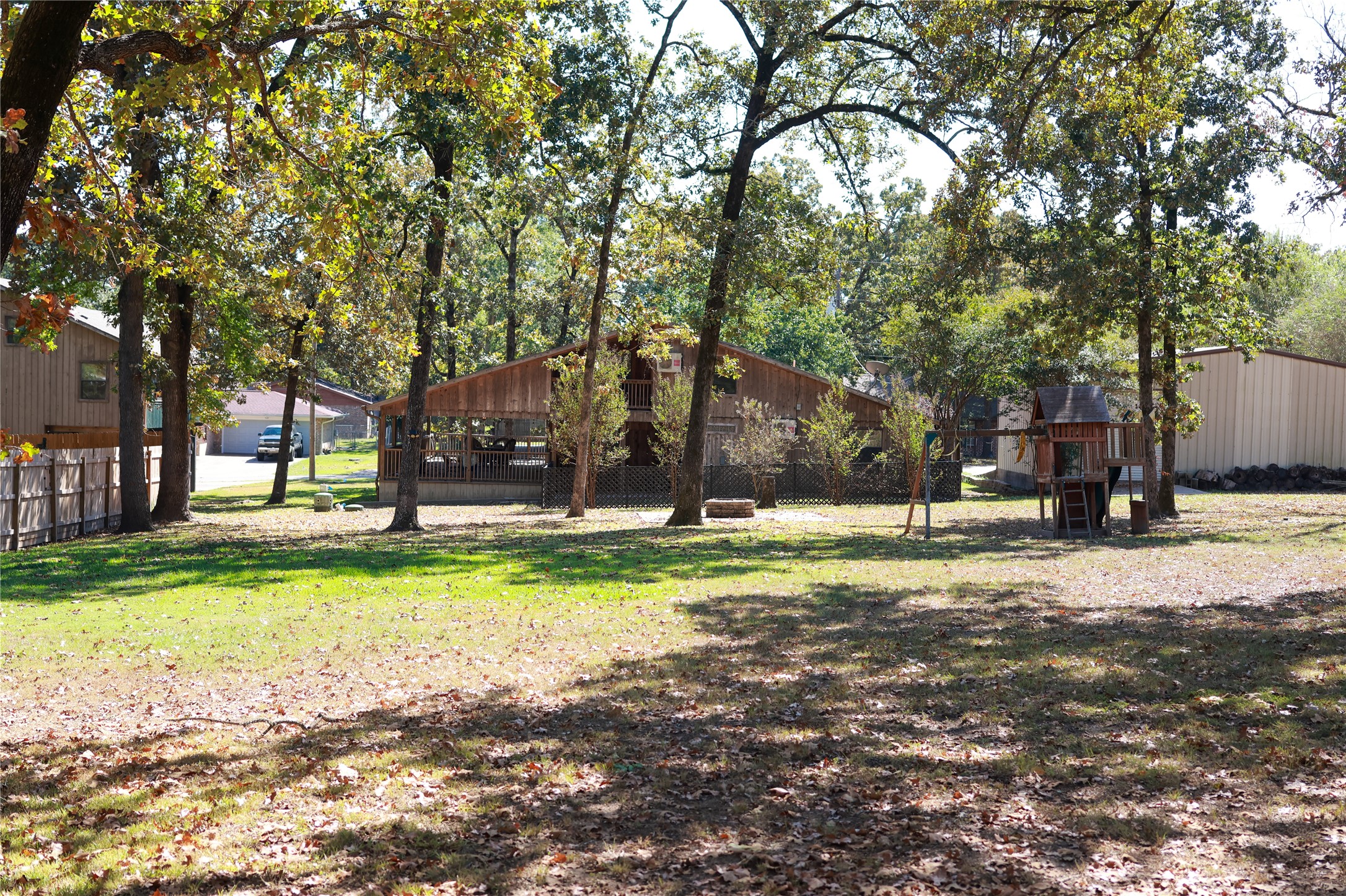 137 Elliott Cove Loop Trinity, TX 75862 - Photo 8 of 18 a view of a house with a yard