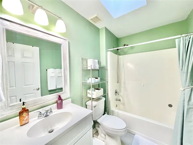 a workspace with furniture and a window