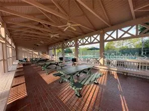 a view of a park with iron fence