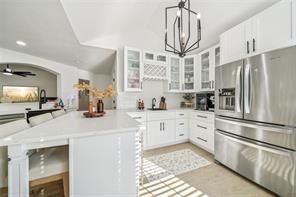 198 Celestial Run Winder, GA 30680 - Photo 2 of 30 a kitchen with stainless steel appliances a refrigerator sink and cabinets