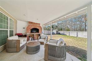 198 Celestial Run Winder, GA 30680 - Photo 24 of 30 a living room with furniture and a floor to ceiling window