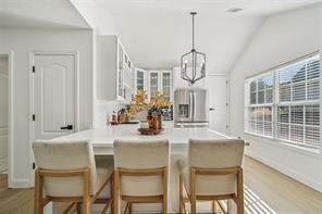 198 Celestial Run Winder, GA 30680 - Photo 27 of 30 a dining room with furniture a chandelier and window