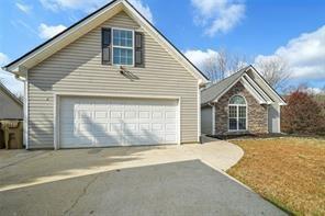 198 Celestial Run Winder, GA 30680 - Photo 30 of 30 a front view of a house with a yard