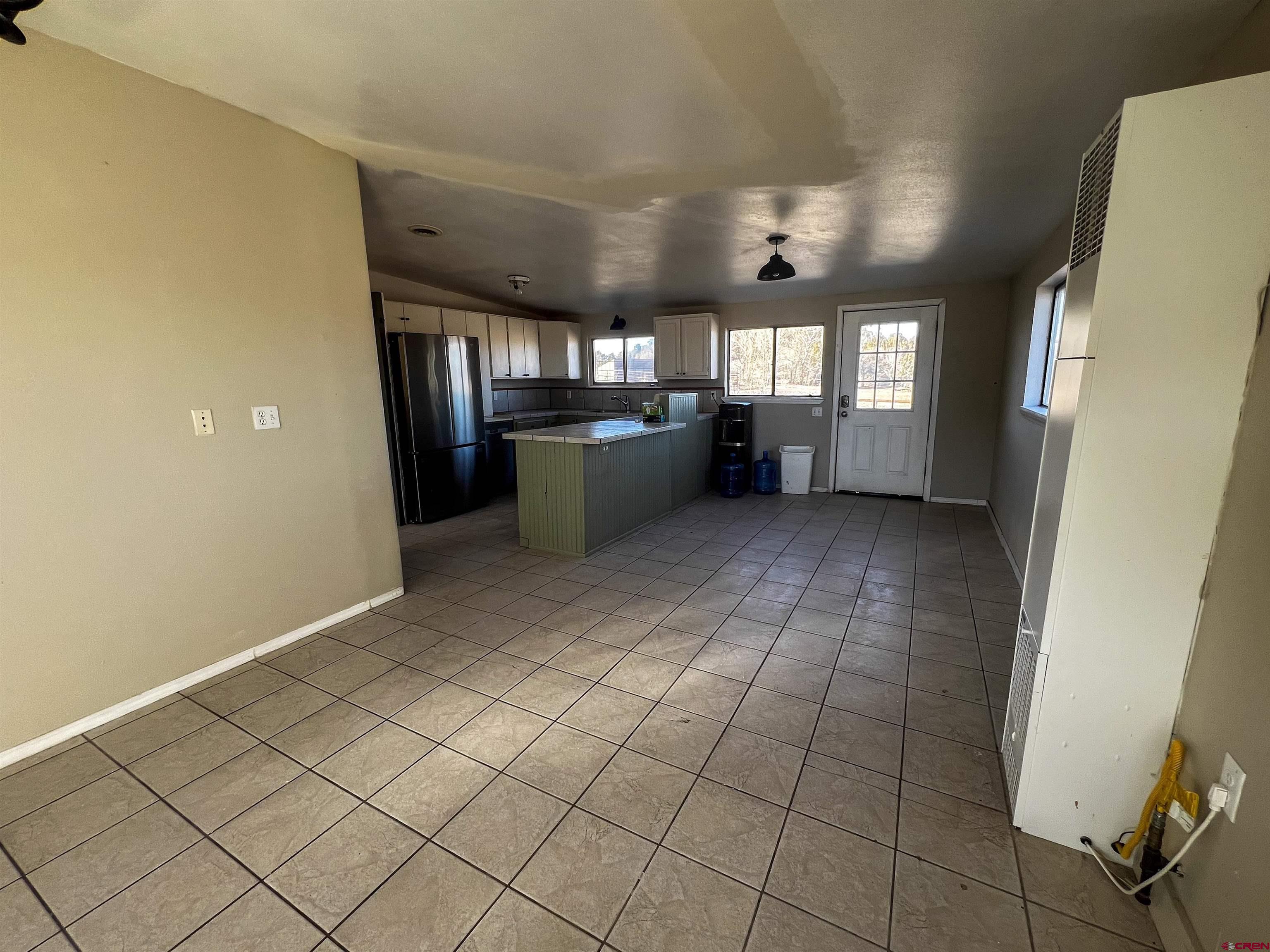 3350 County Road 319 Ignacio, CO 81137 - Photo 11 of 14 a view of a kitchen with a sink and a window