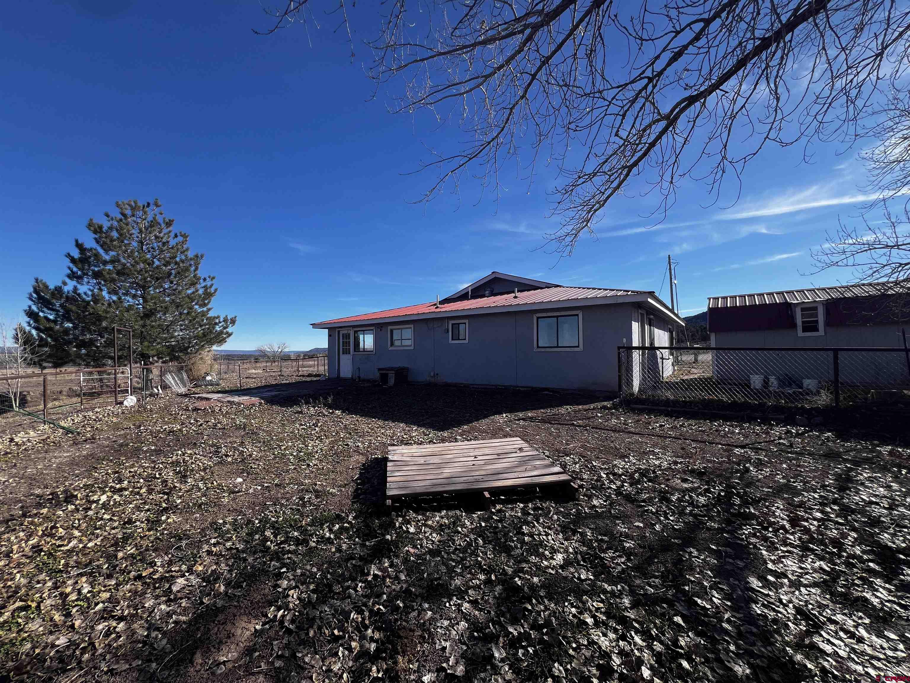 3350 County Road 319 Ignacio, CO 81137 - Photo 2 of 14 a view of house with backyard space