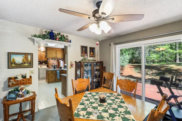 a kitchen with a sink cabinets and window