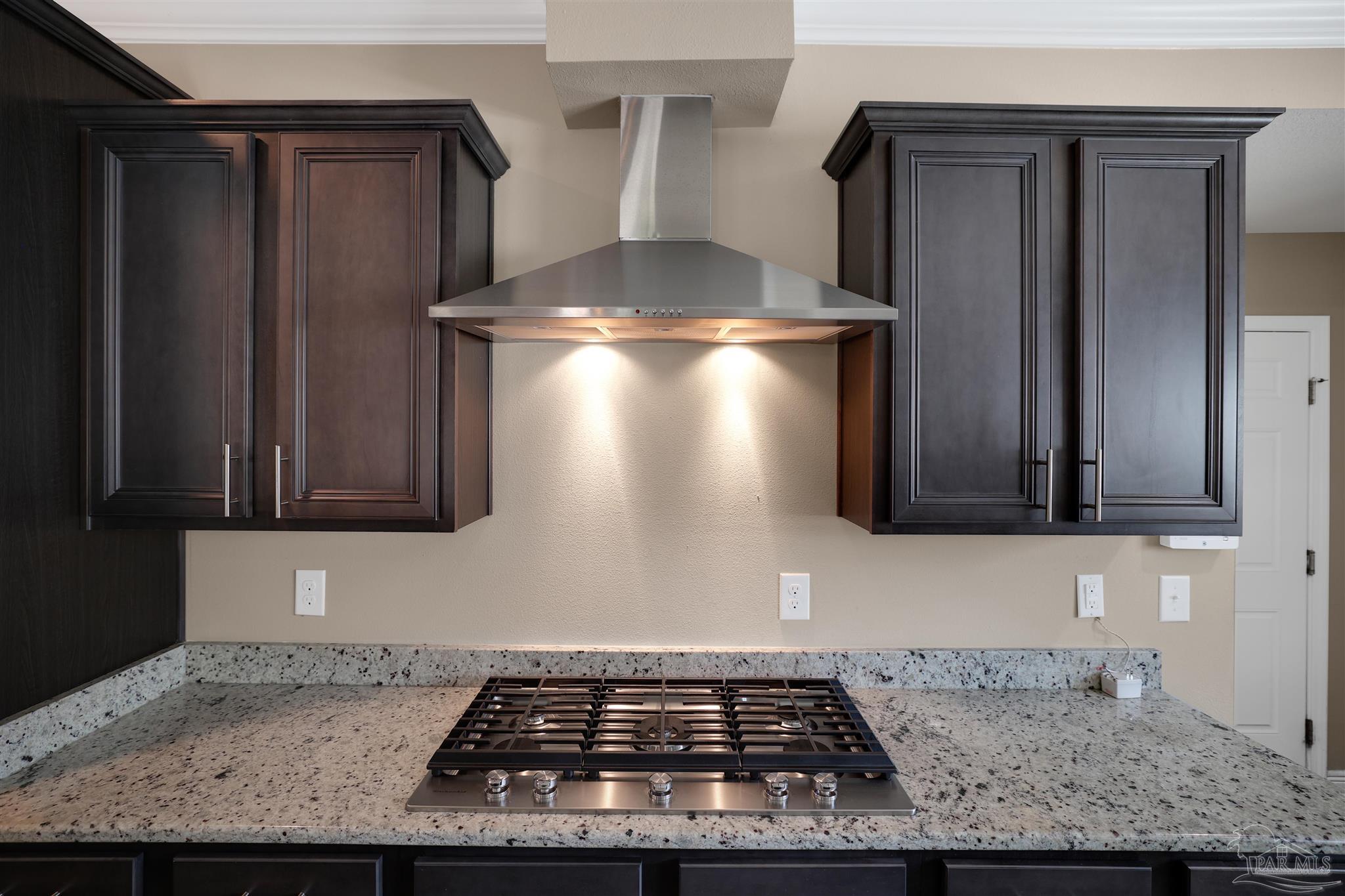 5847 Mossy Creek Lane Pace, FL 32571 - Photo 13 of 50 a view of a stove top oven sitting inside of a kitchen
