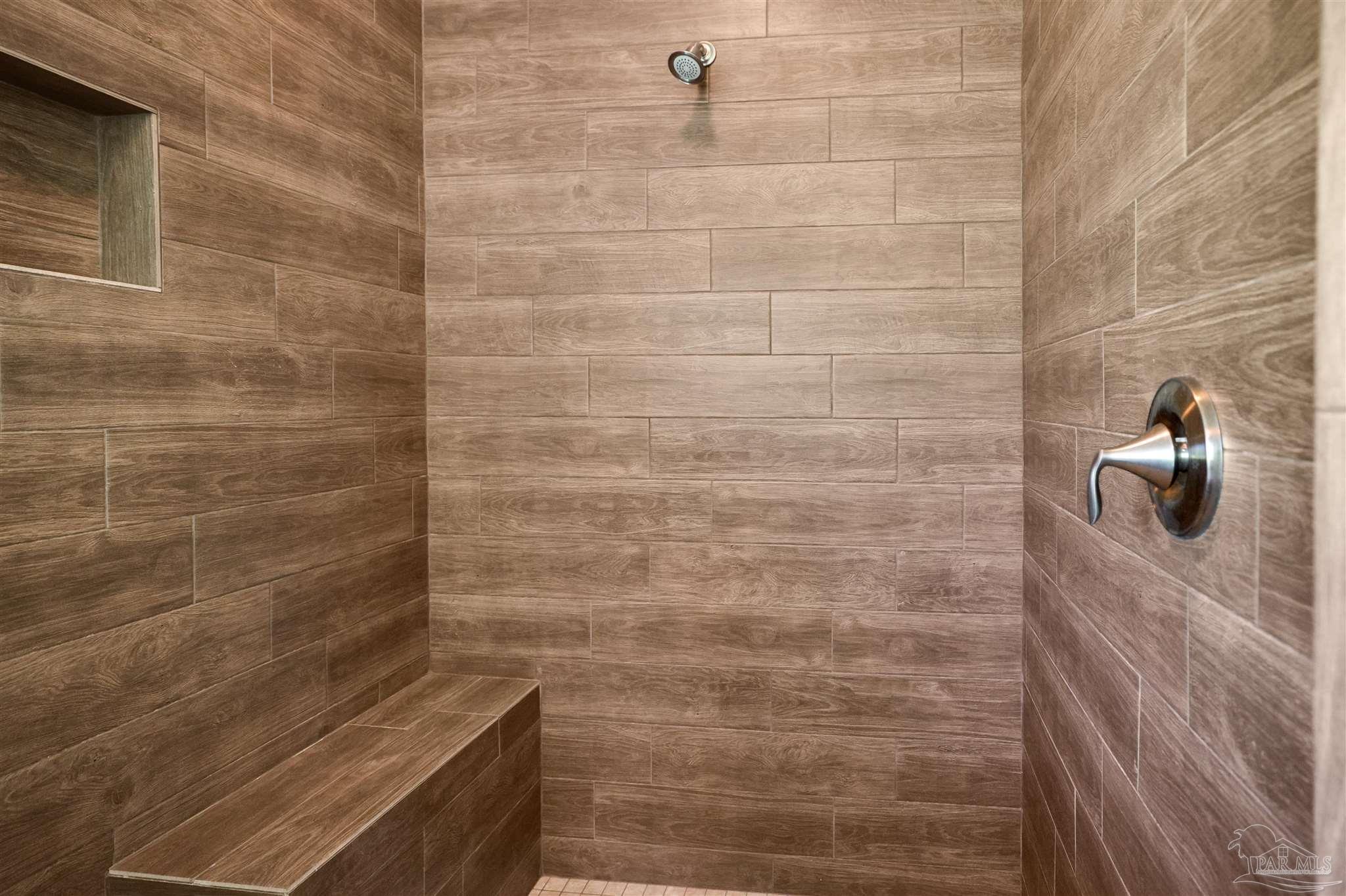 5847 Mossy Creek Lane Pace, FL 32571 - Photo 19 of 50 a bathroom with a shower