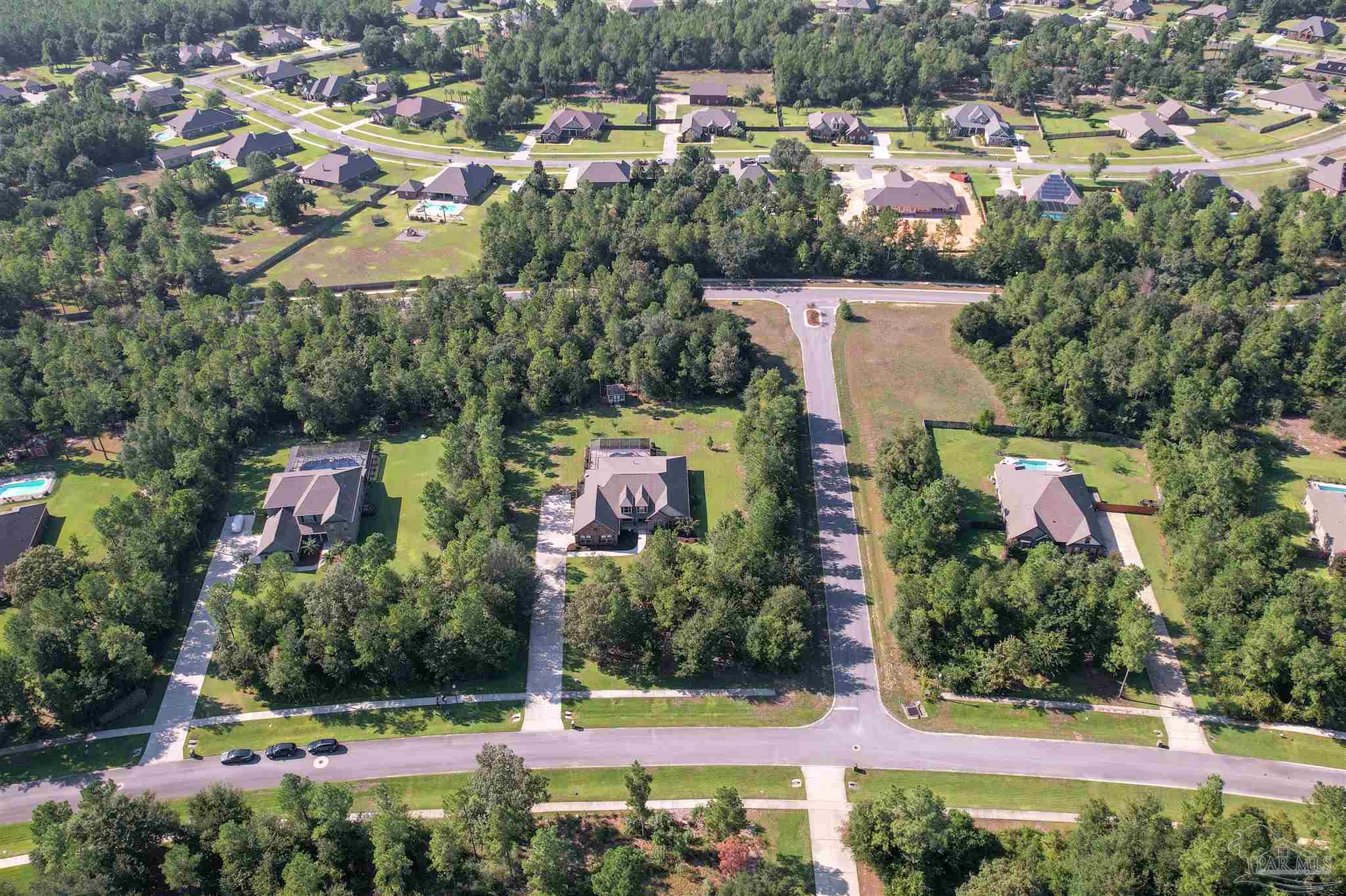5847 Mossy Creek Lane Pace, FL 32571 - Photo 46 of 50 a view of swimming pool and outdoor space