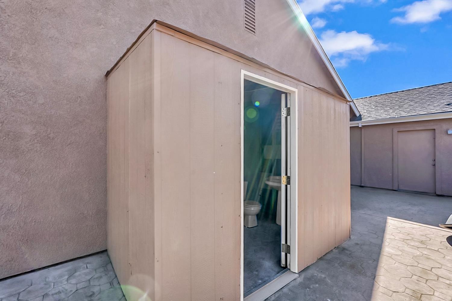 5432 Roselena Way Keyes, CA 95328 - Photo 12 of 16 a view of a house with backyard