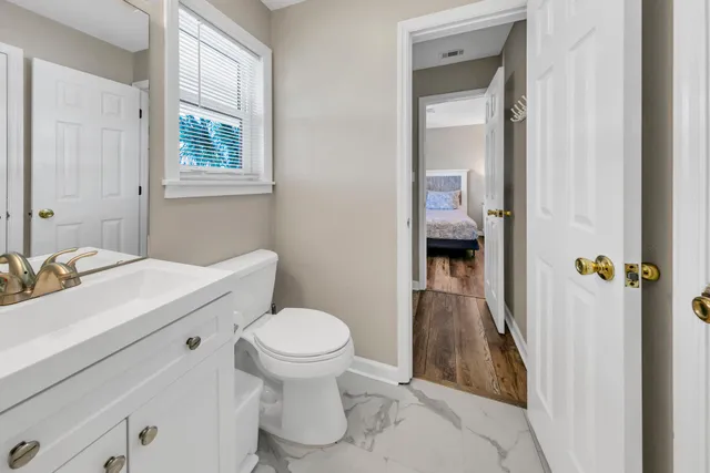 a bathroom with a sink and a toilet