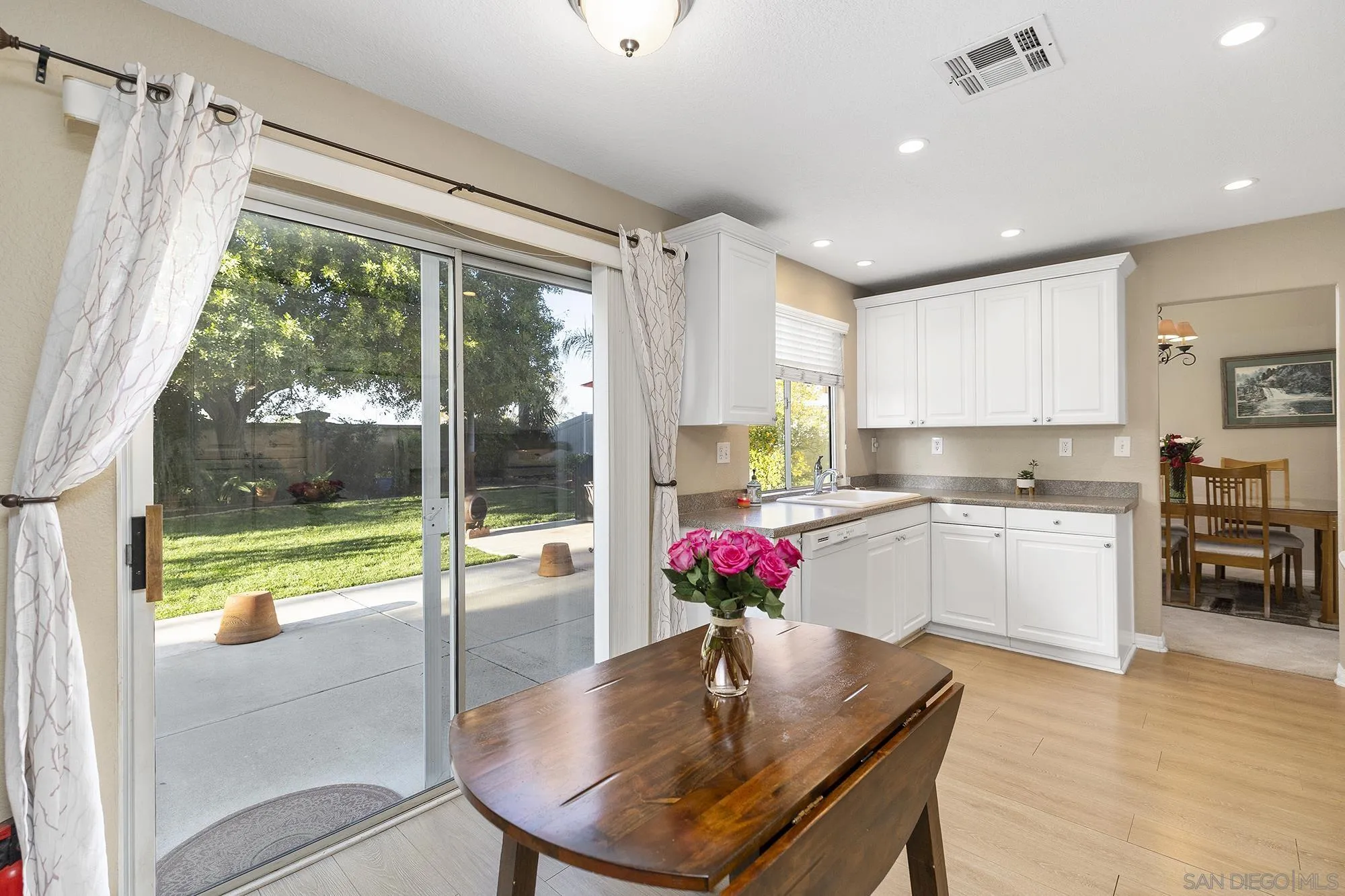31450 Corte Rimola Temecula, CA 92592 - Photo 11 of 31 a kitchen with granite countertop kitchen island stainless steel appliances a sink and cabinets