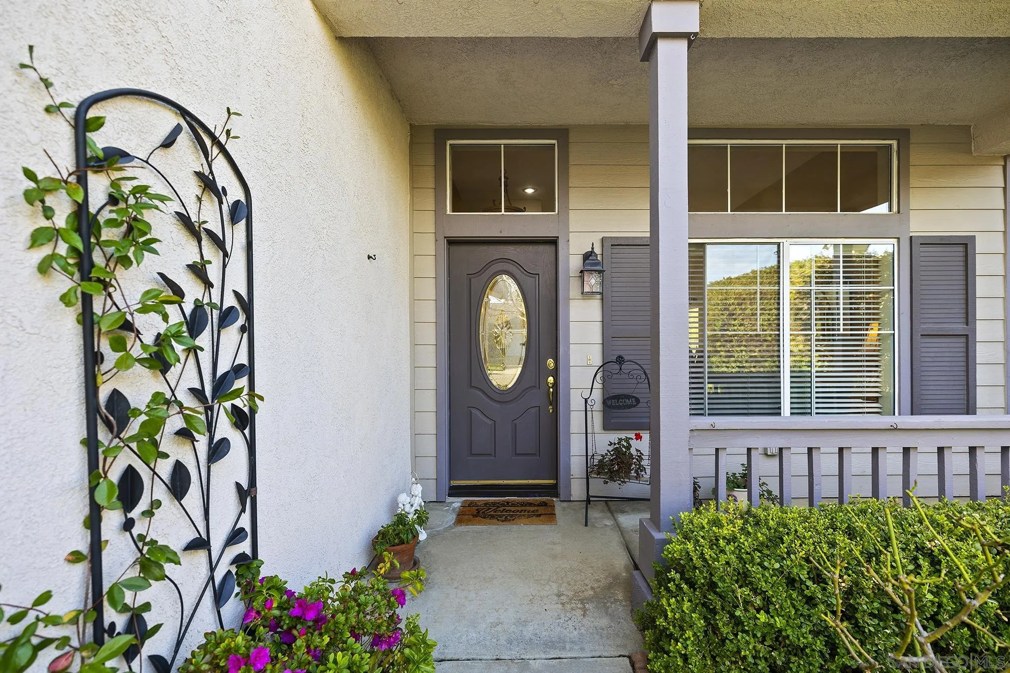 31450 Corte Rimola Temecula, CA 92592 - Photo 2 of 31 a front view of a house with a potted plant