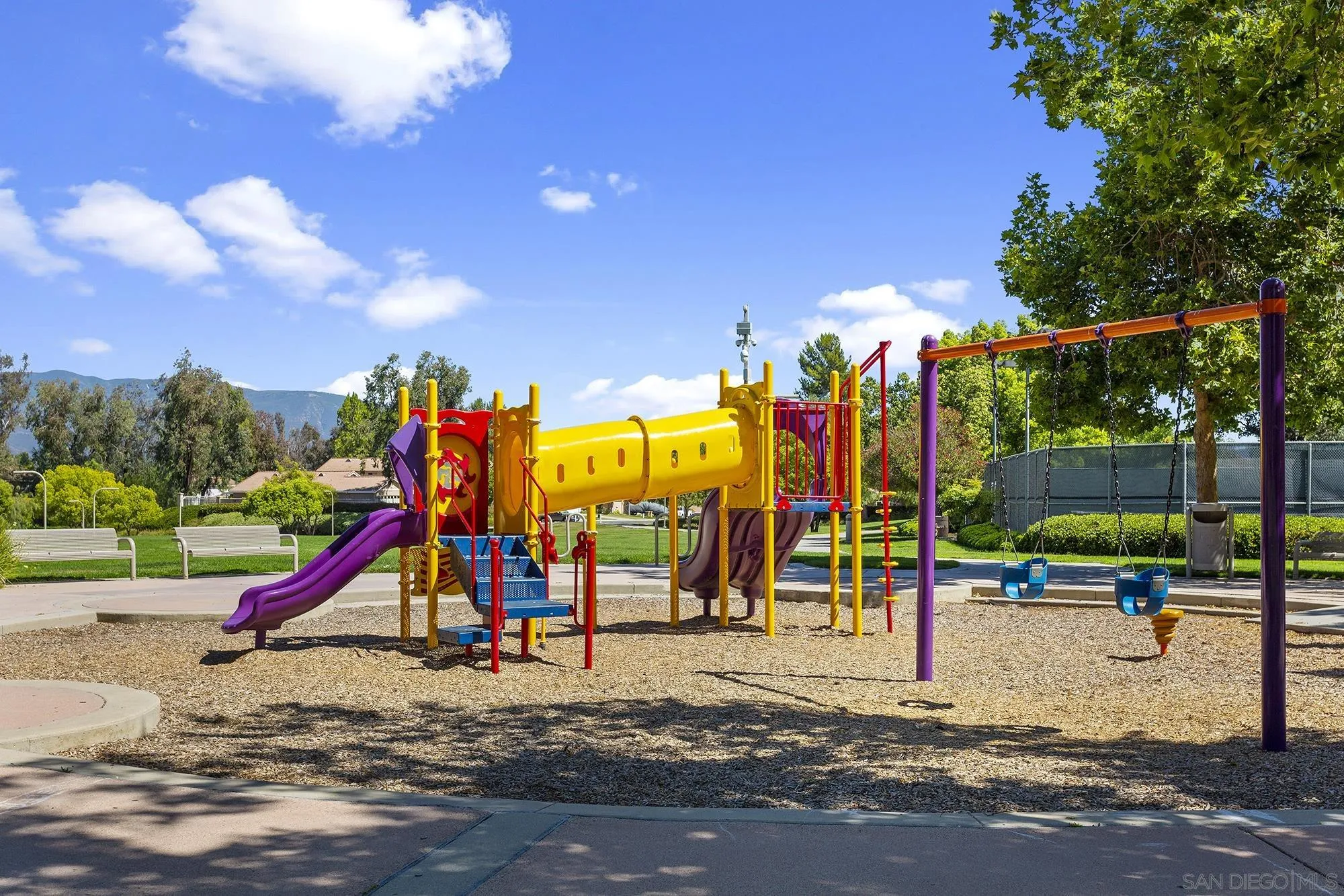 31450 Corte Rimola Temecula, CA 92592 - Photo 30 of 31 a view of a park with swings and slides