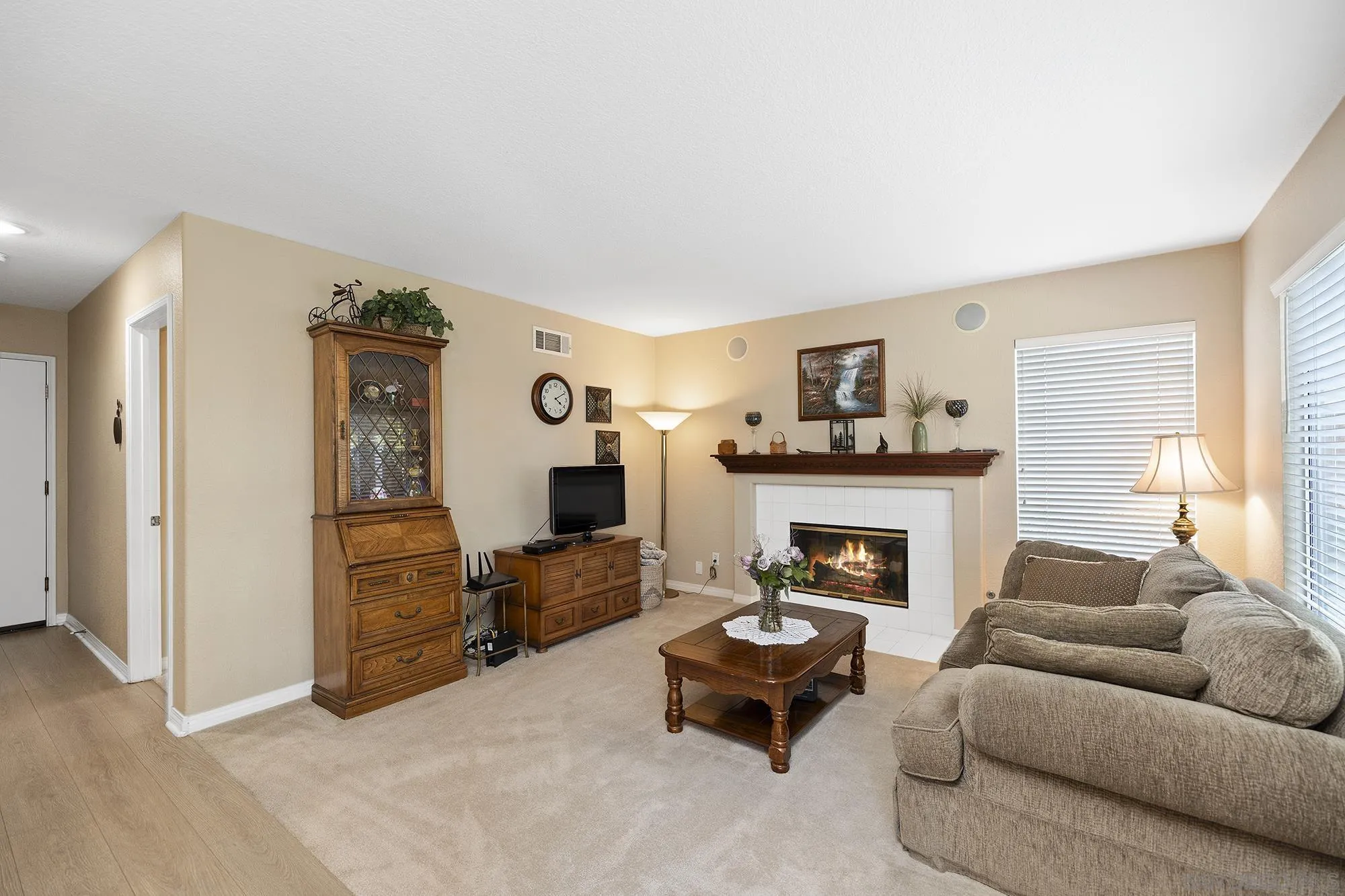 31450 Corte Rimola Temecula, CA 92592 - Photo 6 of 31 a living room with furniture and a fireplace