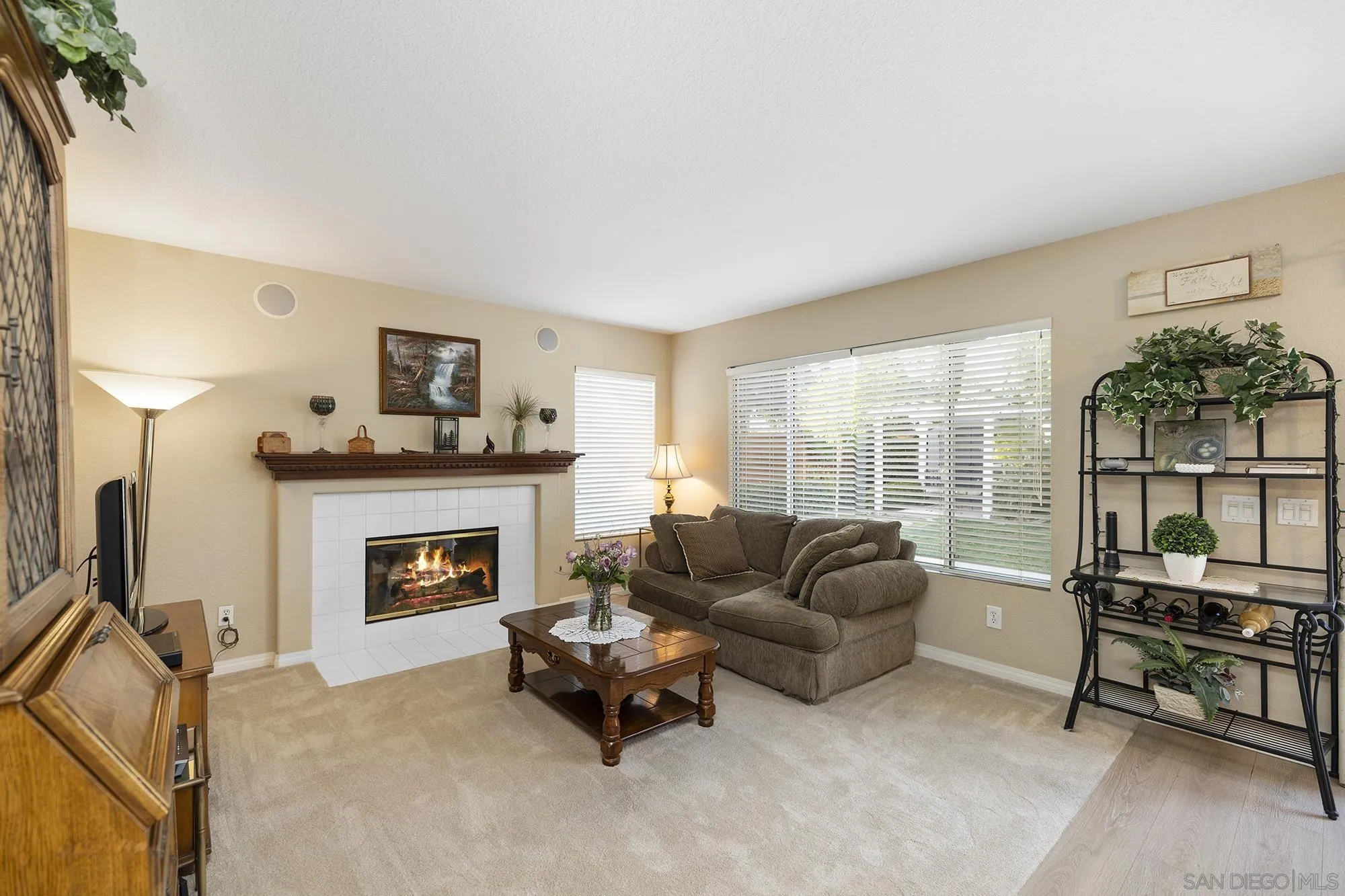 31450 Corte Rimola Temecula, CA 92592 - Photo 7 of 31 a living room with furniture and a fireplace