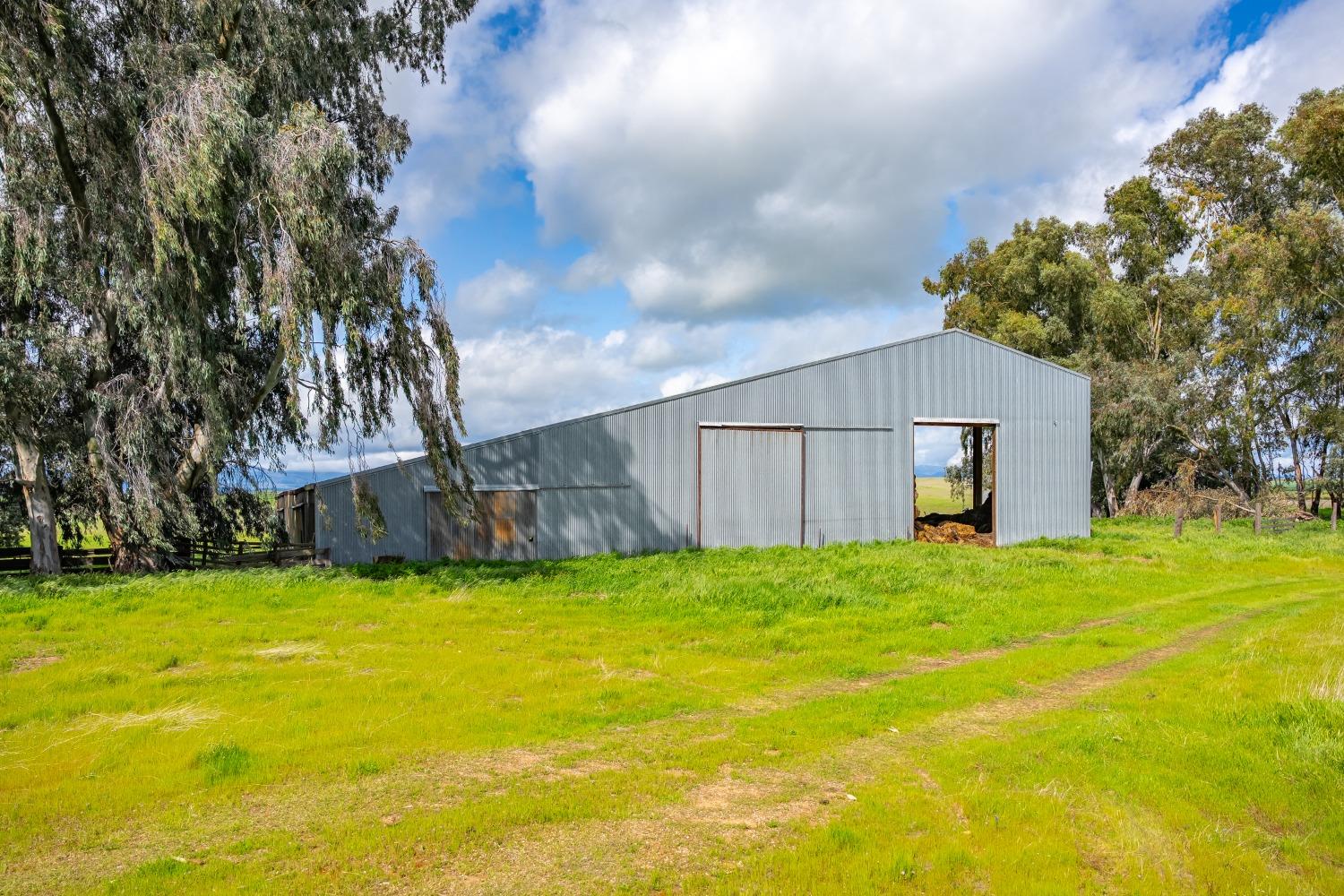 0 County Road 48 Willows, CA 95988 - Photo 26 of 53 a view of a house with a yard and garage