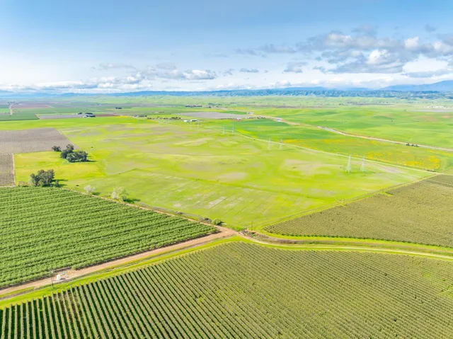 a view of an swimming pool with an outdoor space and seating area