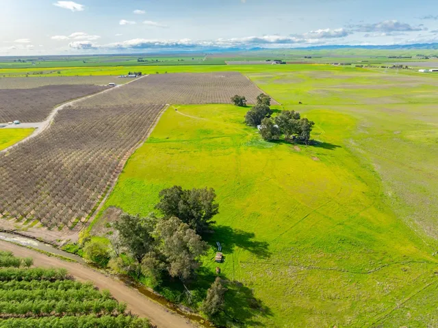 a view of a swimming pool and an outdoor space