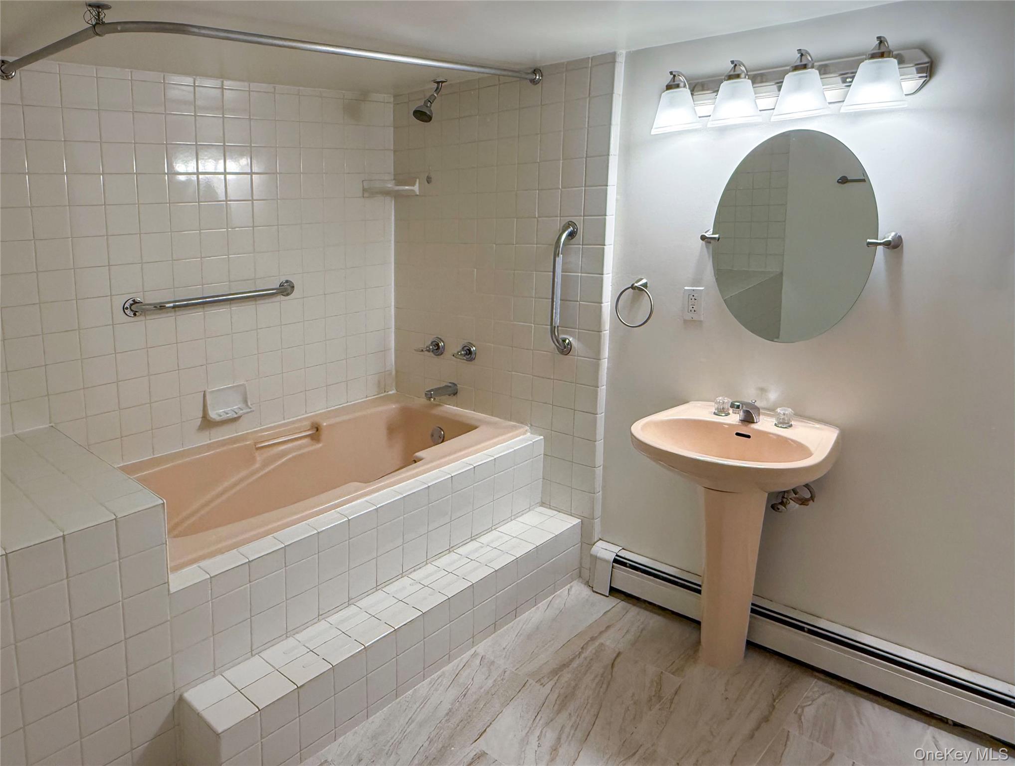 504 Highway 9D, Unit C Beacon, NY 12508 - Photo 8 of 9 a bathroom with a sink and a mirror