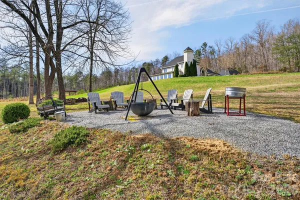 a view of outdoor space with playground and green space