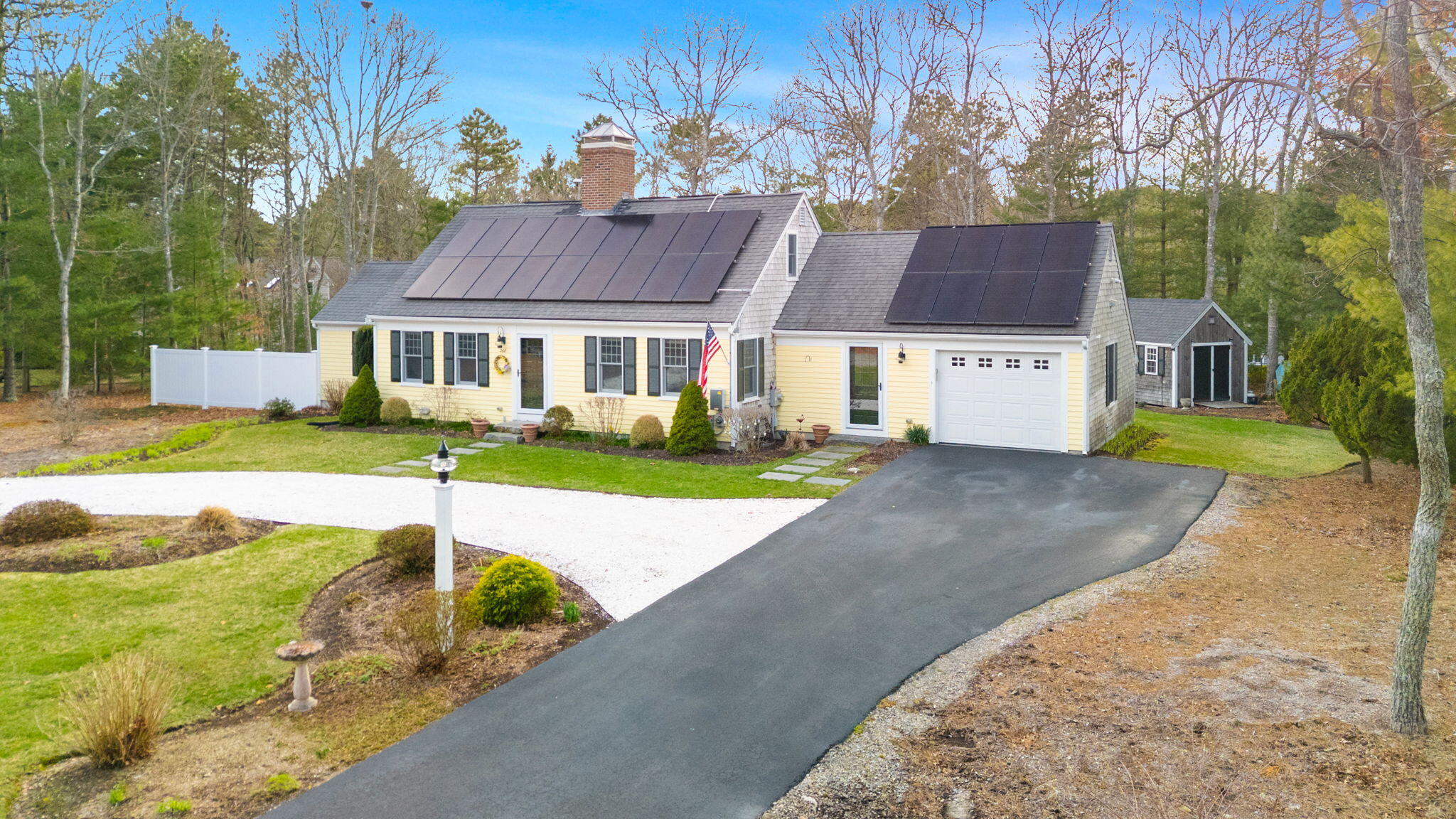 268 Winding Cove Road Marstons Mills, MA 02648 - Photo 1 of 40 front view of a house with a yard