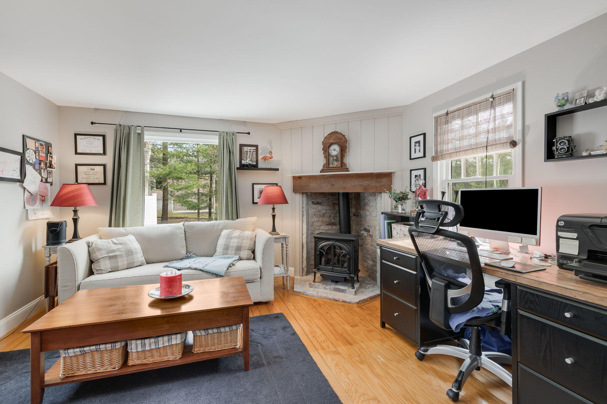 268 Winding Cove Road Marstons Mills, MA 02648 - Photo 14 of 40 a living room with furniture a flat screen tv and a fireplace