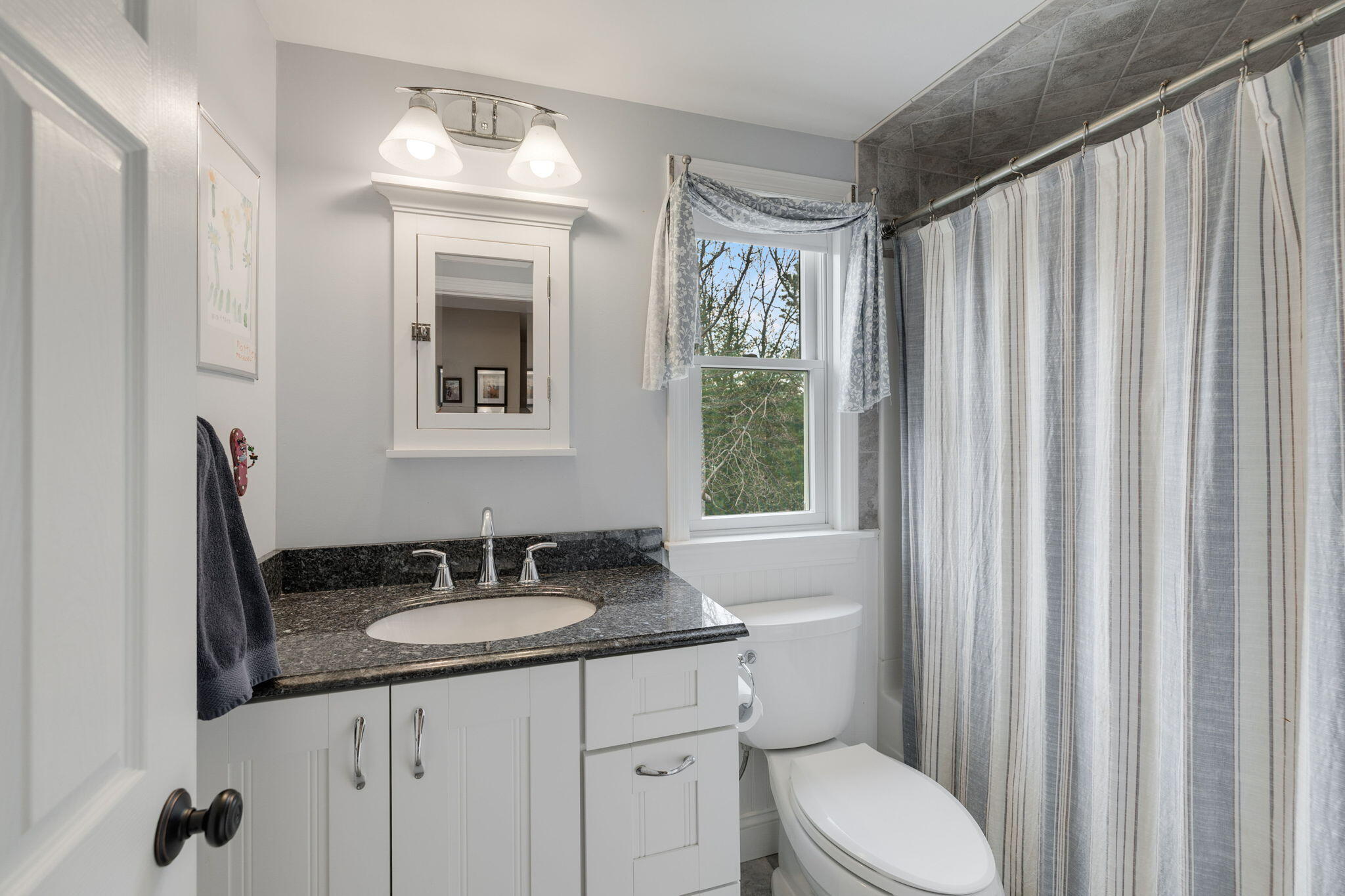 268 Winding Cove Road Marstons Mills, MA 02648 - Photo 16 of 40 a bathroom with a granite countertop sink vanity mirror and toilet
