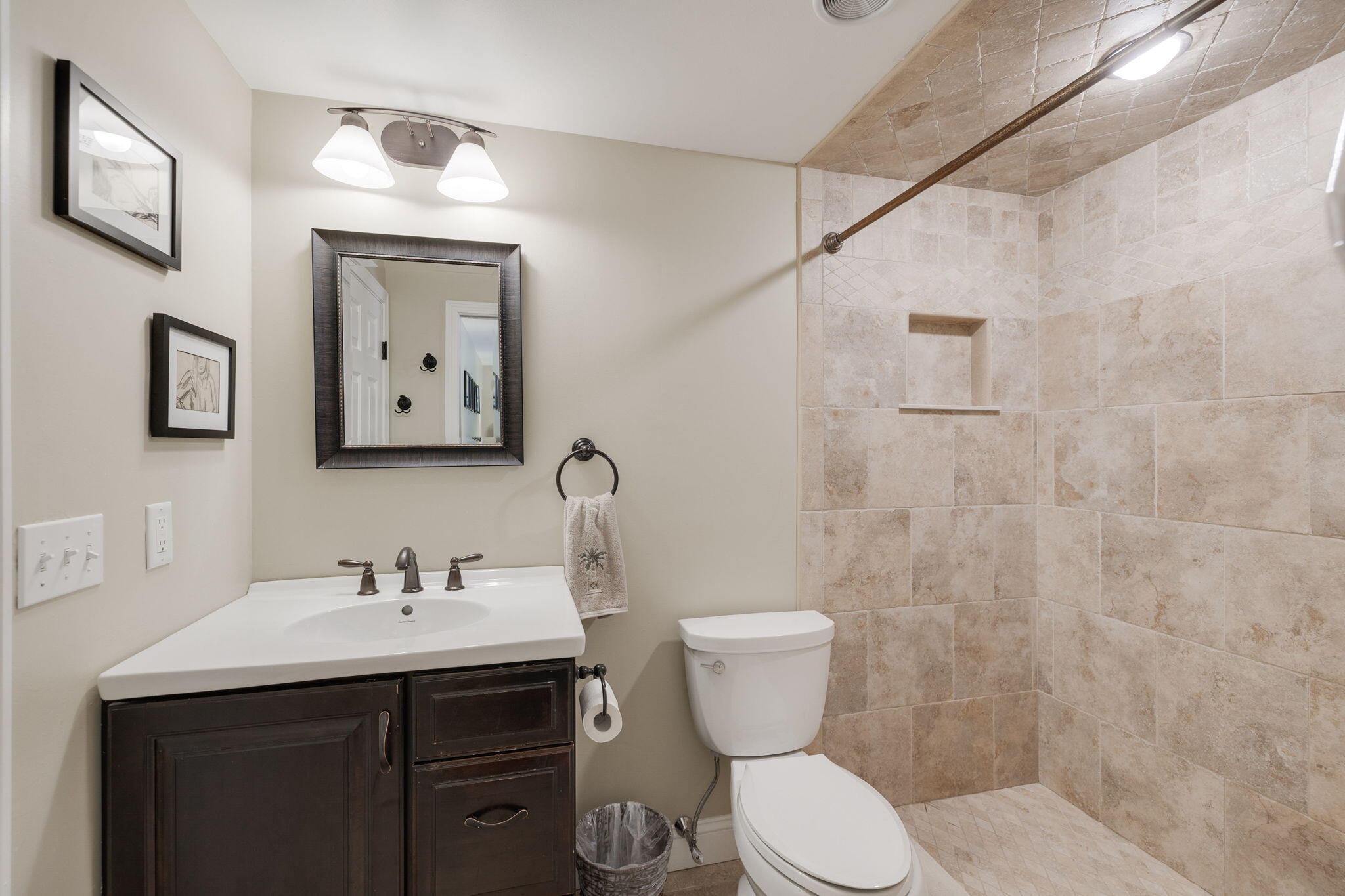 268 Winding Cove Road Marstons Mills, MA 02648 - Photo 19 of 40 a bathroom with a toilet sink and mirror