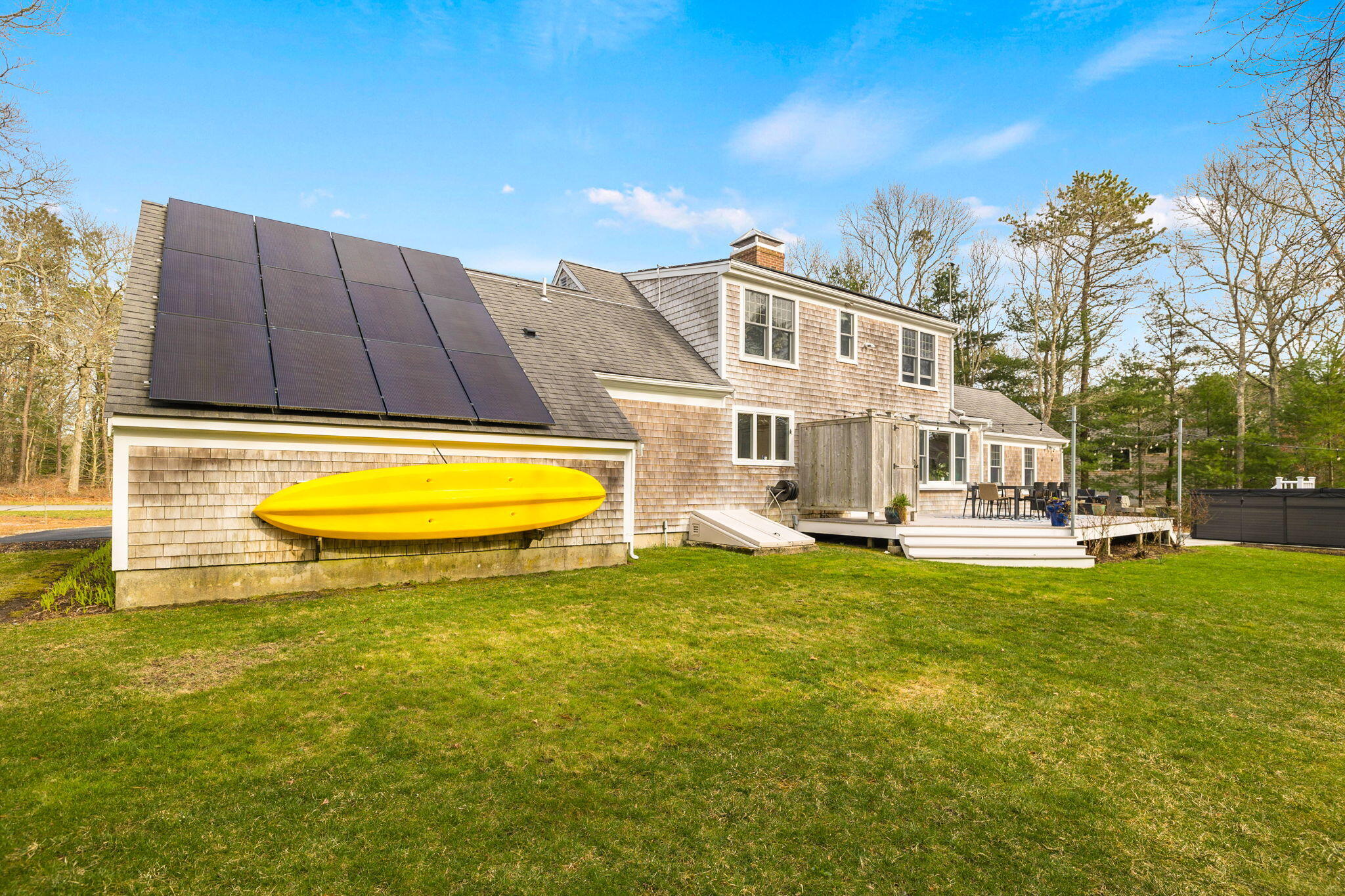 268 Winding Cove Road Marstons Mills, MA 02648 - Photo 25 of 40 a view of a house with a swimming pool