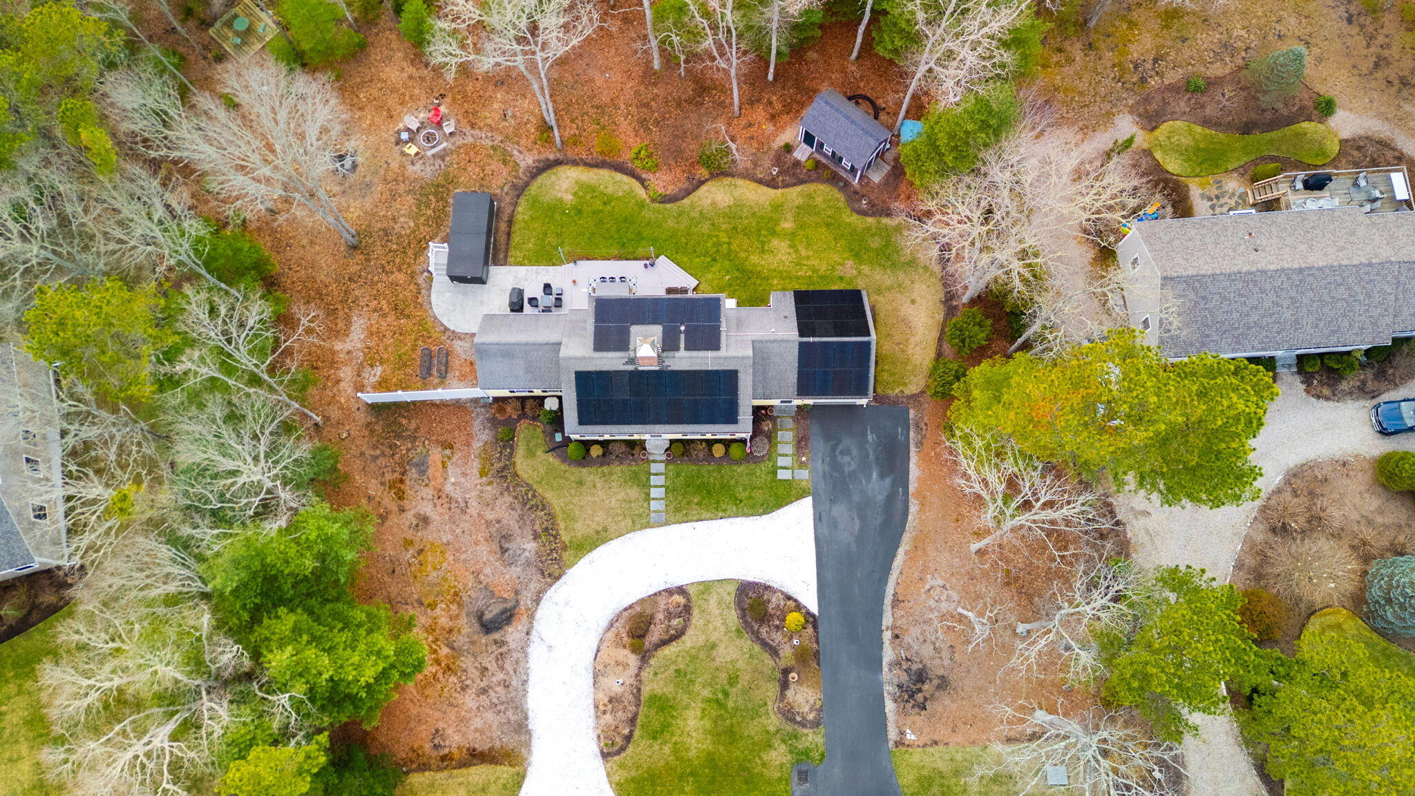 268 Winding Cove Road Marstons Mills, MA 02648 - Photo 35 of 40 a view of a swimming pool with a yard