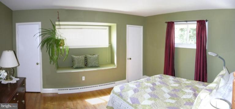 6710 Tweedbrook Road Baltimore, MD 21239 - Photo 4 of 6 a view of a bedroom