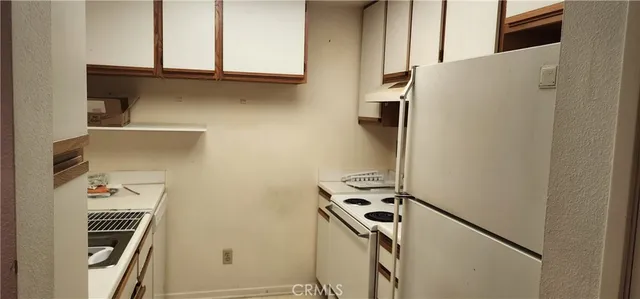 a view of a bathroom with a mirror