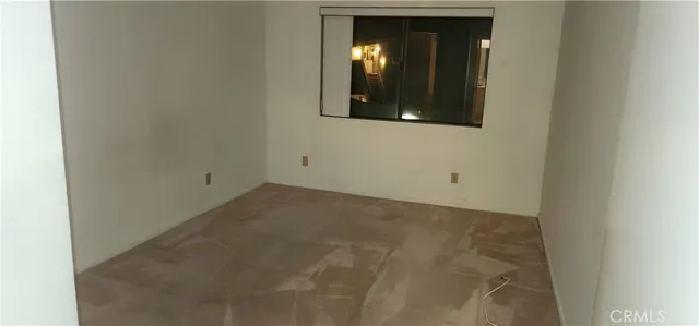 a view of a bathroom from a hallway