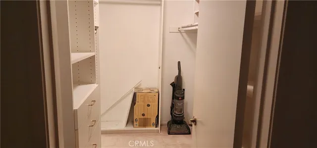 a bathroom with a shower and a mirror