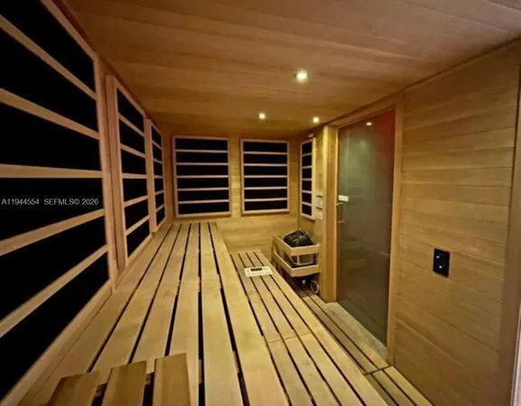 a view of a swimming pool with a lake view