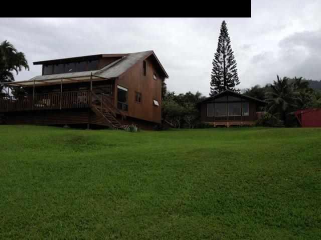 180 Ulaino Road Hana, HI 96713 - Photo 2 of 26 a front view of a house with garden