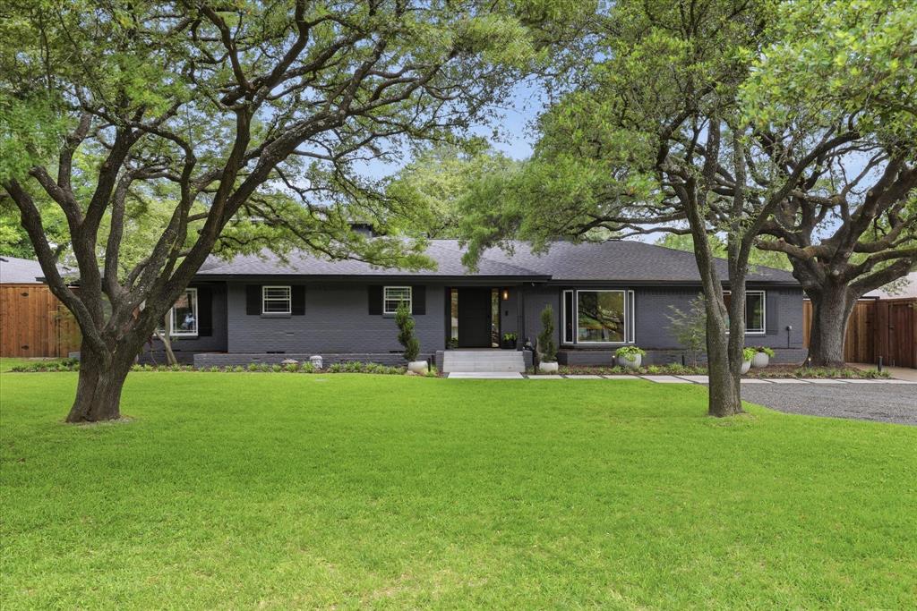 6914 Northaven Road Dallas, TX 75230 - Photo 34 of 40 Beautifully treed property with modern exterior updates.