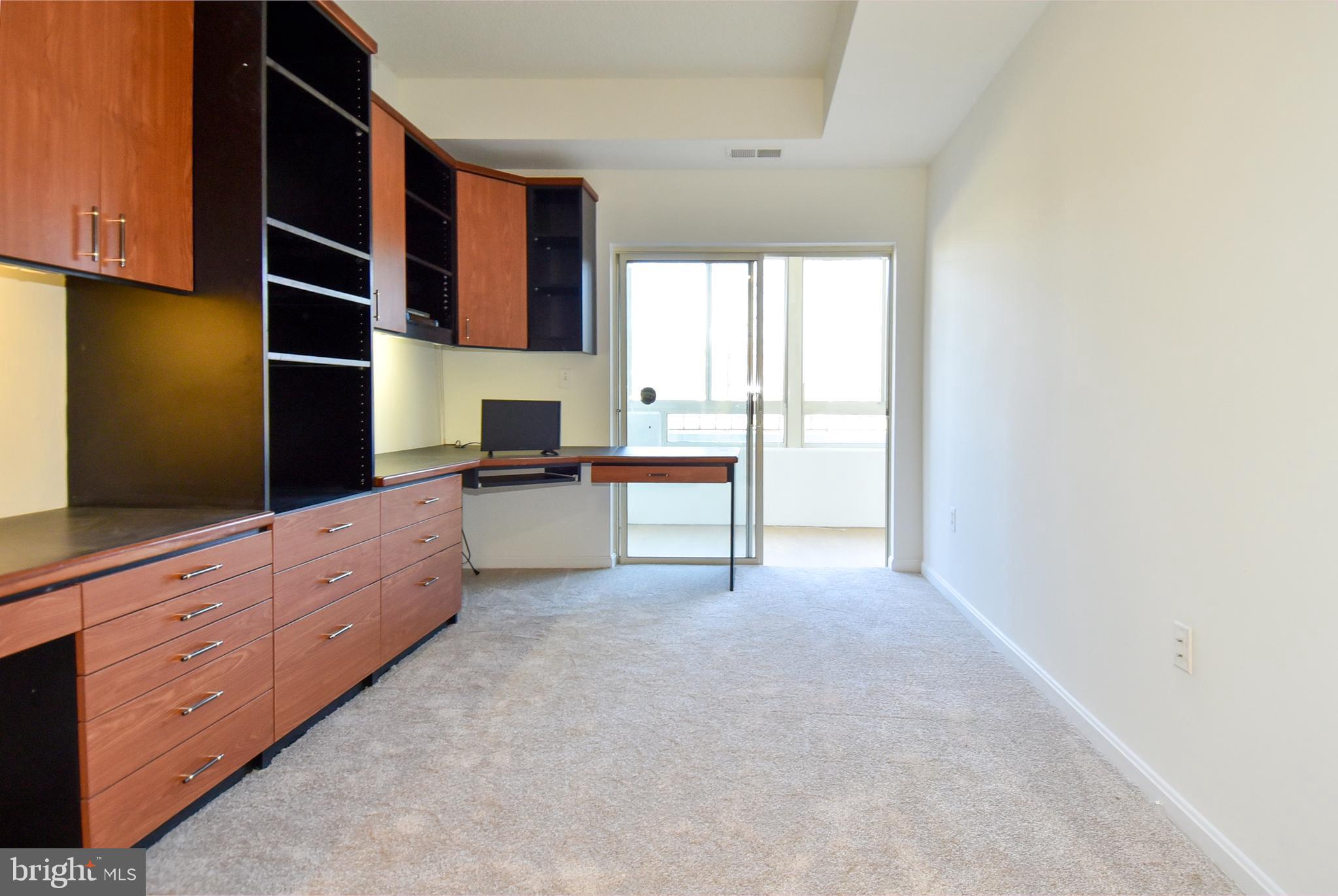 14801 Pennfield Circle, Unit 102 Silver Spring, MD 20906 - Photo 51 of 56 2nd Bedroom, will remove built-in's upon request