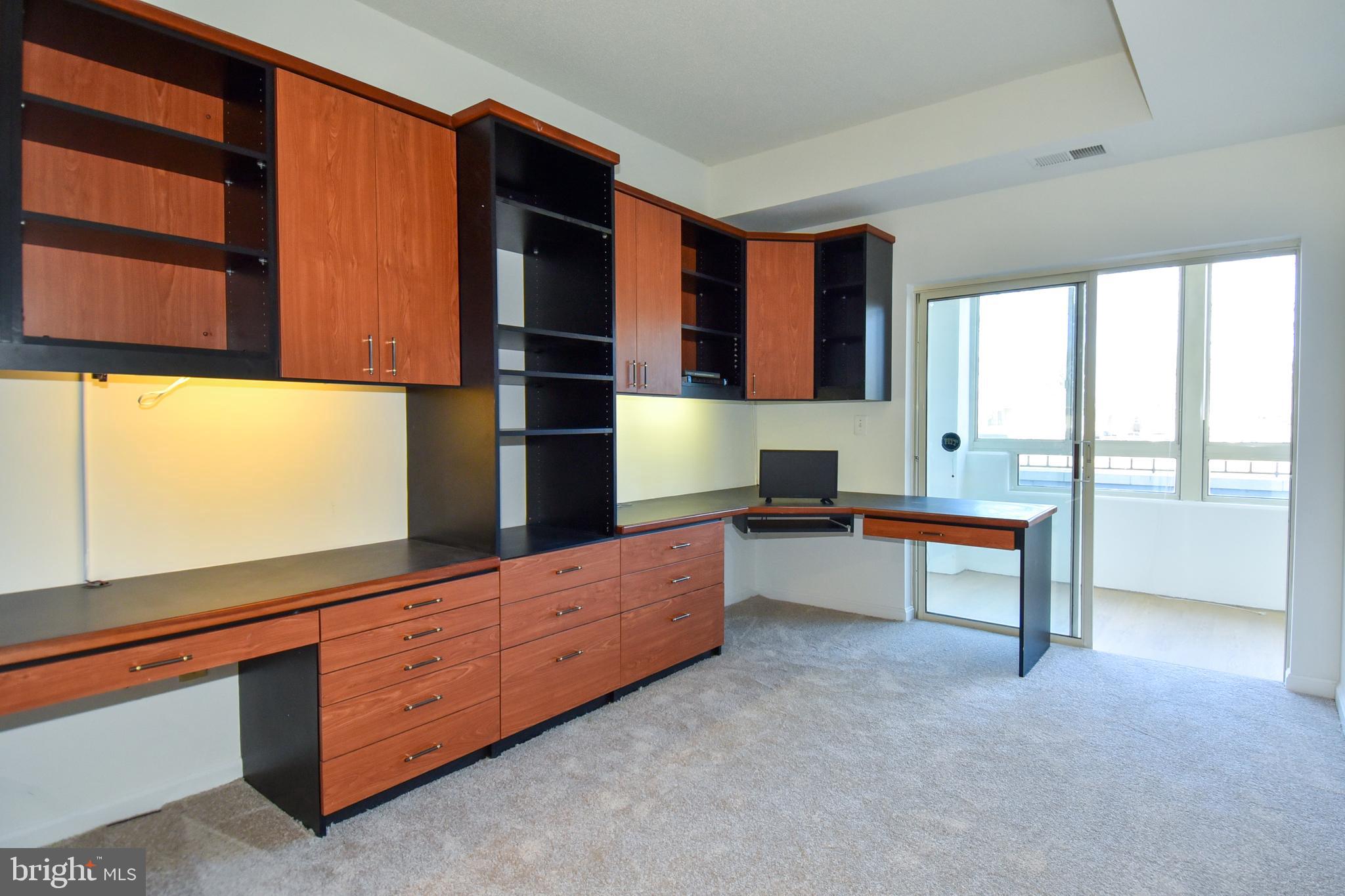 14801 Pennfield Circle, Unit 102 Silver Spring, MD 20906 - Photo 52 of 56 2nd Bedroom, will remove built-in's upon request