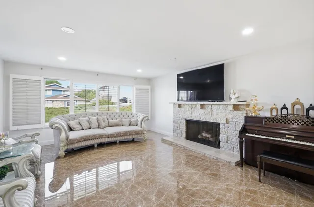 a bathroom with a sink mirror toilet and shower