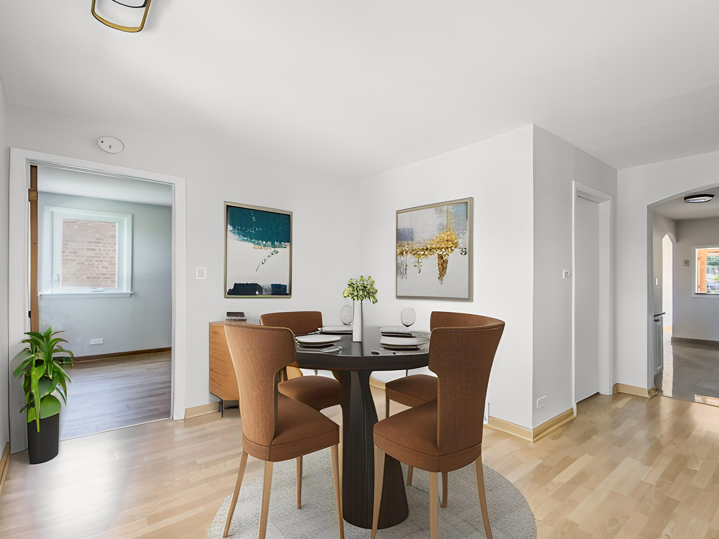 4313 Ruby Street Schiller Park, IL 60176 - Photo 13 of 25 a view of a dining room with furniture and wooden floor