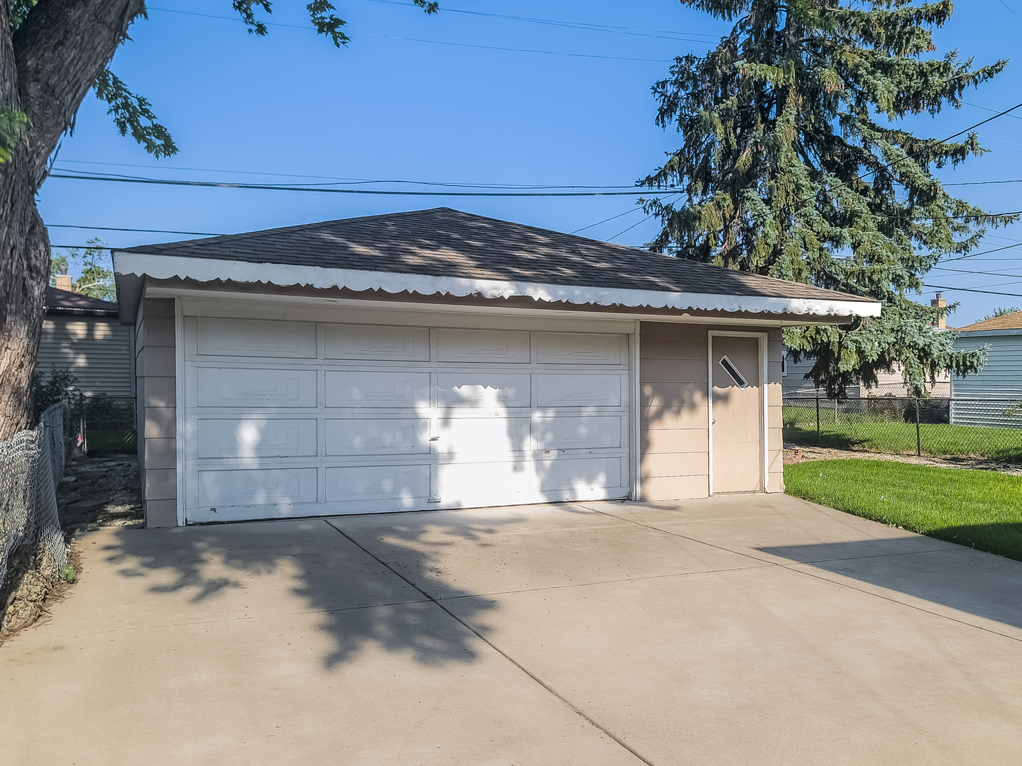 4313 Ruby Street Schiller Park, IL 60176 - Photo 20 of 25 a front view of a house with a yard