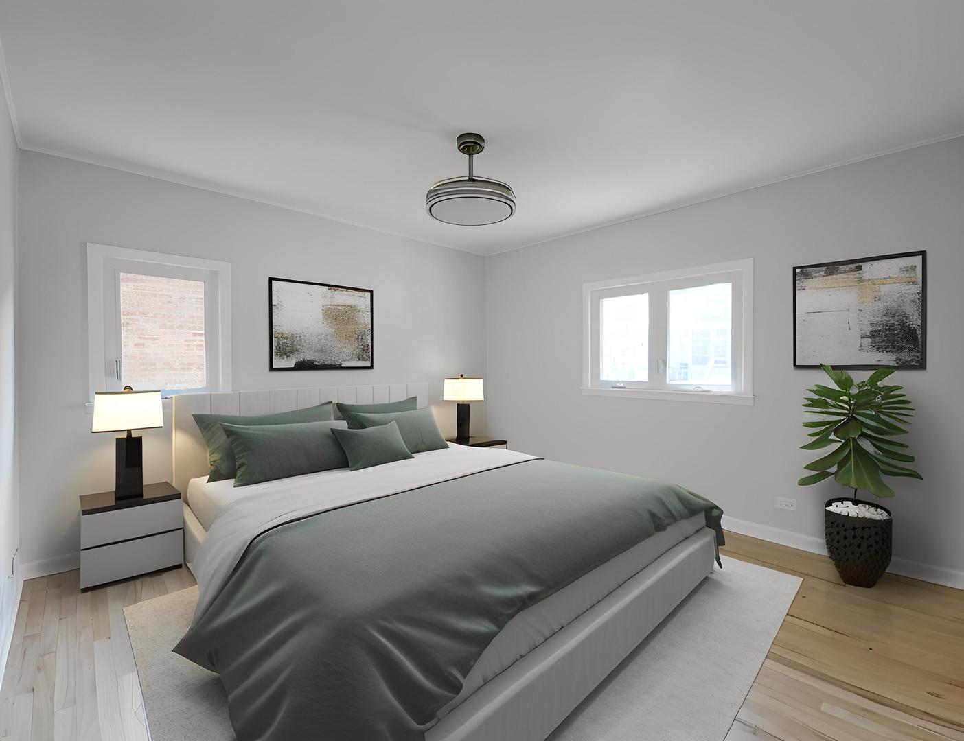 4313 Ruby Street Schiller Park, IL 60176 - Photo 7 of 25 a bedroom with a bed a chandelier and a couch