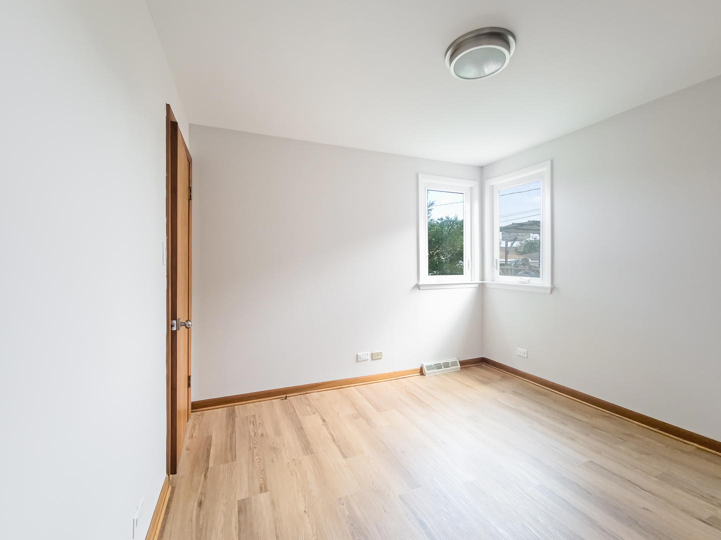 4313 Ruby Street Schiller Park, IL 60176 - Photo 10 of 25 an empty room with a window
