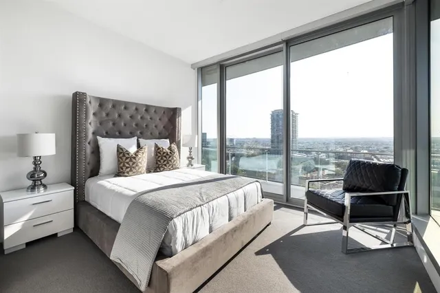 a building with view of street with large windows