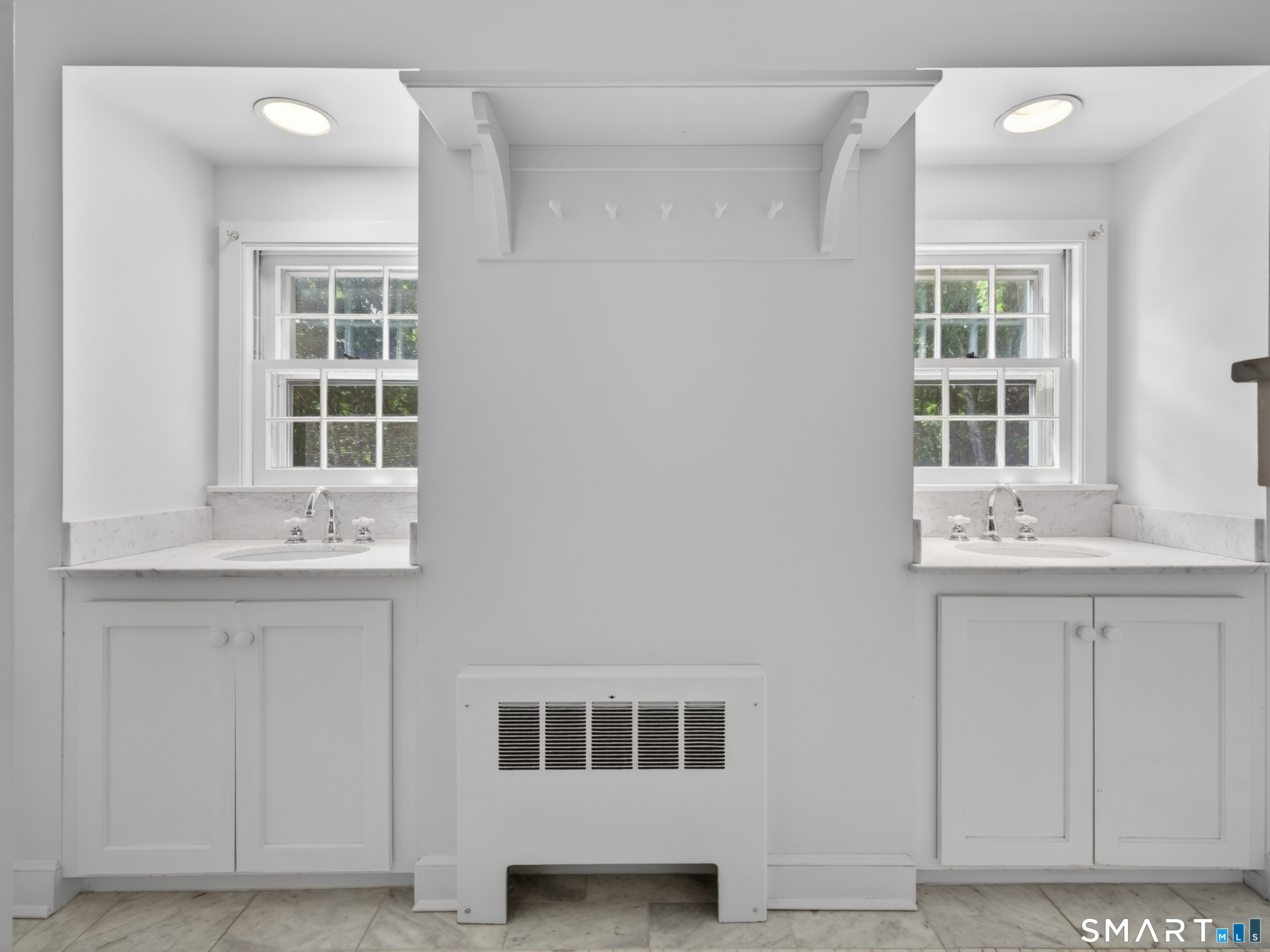 14 Cow Pen Hill Road Killingworth, CT 06419 - Photo 32 of 40 No detail was overlooked in this beautifully designed bathroom, featuring elegant chrome fixtures, custom tilework, and luxurious marble countertops