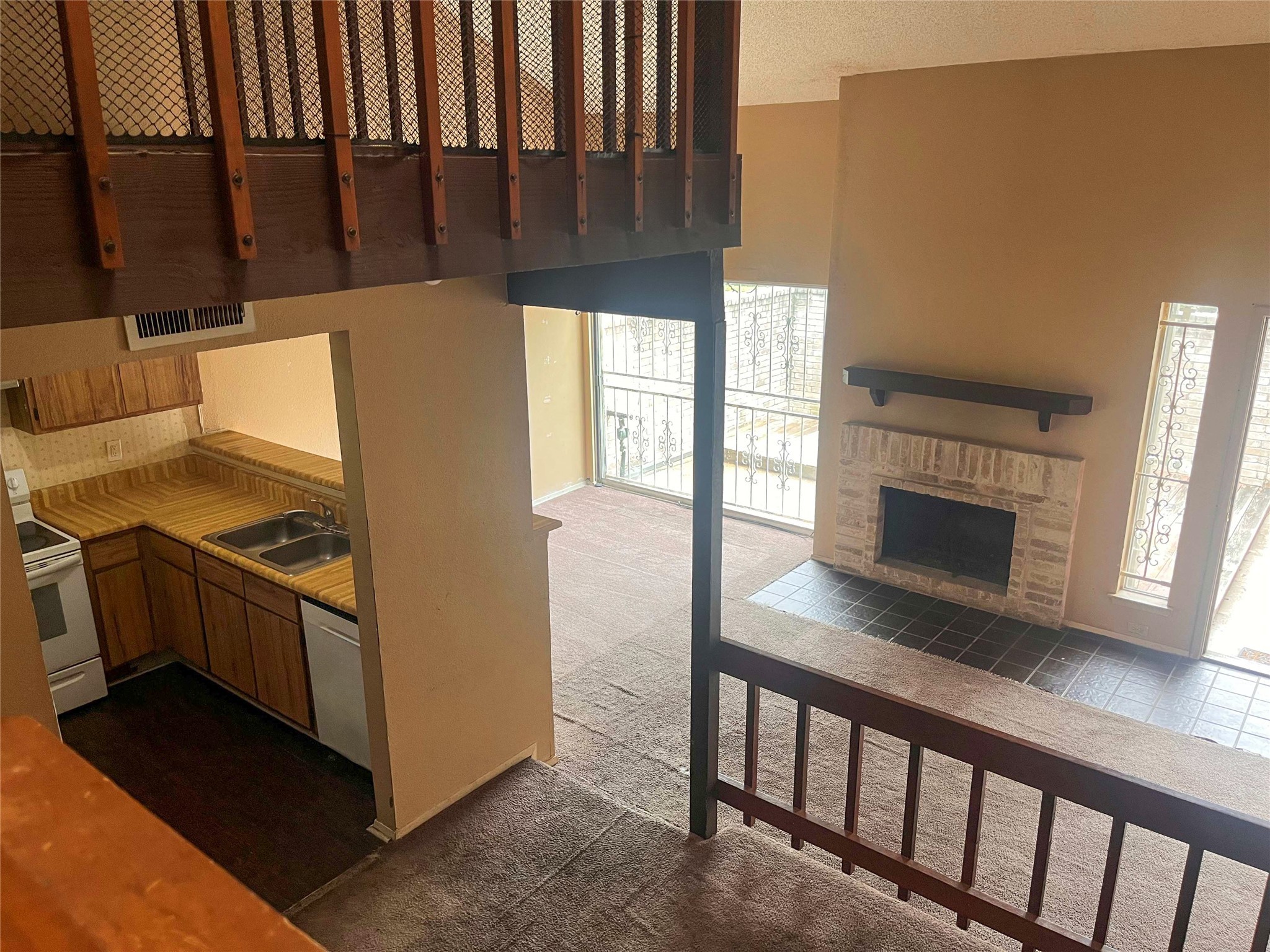 12973 Wirevine Lane Houston, TX 77072 - Photo 7 of 13 Fireplace & Living Room from Above