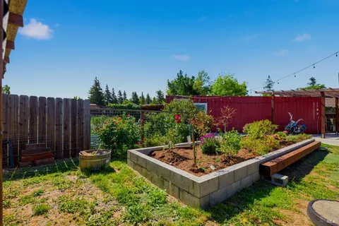 a garden view with a seating space