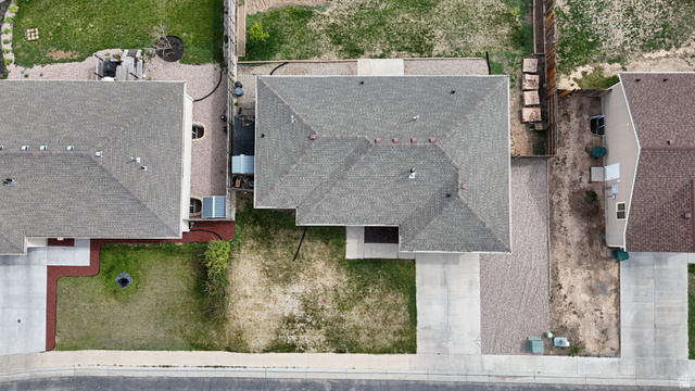 1437 925 South Vernal, UT 84078 - Photo 35 of 47 Overhead perspective showcasing a single-story residence with a gray shingle roof